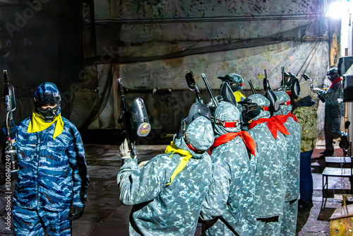 Indoor paintball - preparation for the game and briefing, selective focus