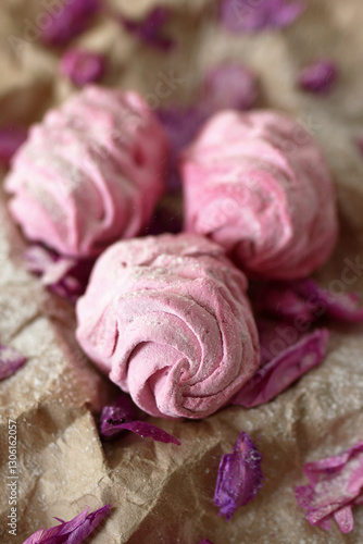 Wallpaper Mural Three soft and fluffy pink berry marshmallows on craft paper with powdered sugar and dry flowers. Torontodigital.ca