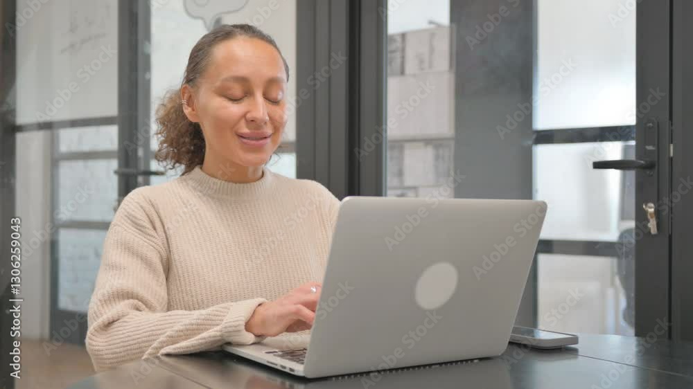 Excited Multiracial Woman Smiling at Camera at Workspace Excited Multiracial Woman Smiling at Camera at Workspace