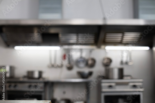 Fototapeta Naklejka Na Ścianę i Meble -  Interior of restaurant kitchen with professional utensils, out of focus