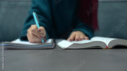 Young woman reading the Bible and making notes, symbolizing faith, devotion, and spiritual study.