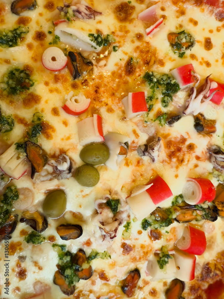 Close-Up of Freshly Baked Seafood Pizza with Cheese, Olives, and Surimi Close-Up of Freshly Baked Seafood Pizza with Cheese, Olives, and Surimi