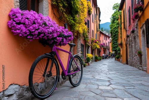 Charming street in an Italian village with colorful buildings, potted flowers, and an old bicycle