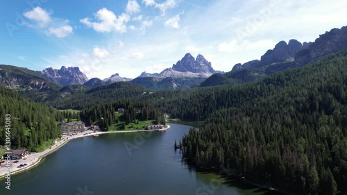 DRONE AERIAL FOOTAGE: Lake Misurina and the Tre Cime di Lavaredo (Three Peaks of Lavaredo) in the Sexten Dolomites of northeastern Italy. They are one of the best-known mountain groups in the Alps.