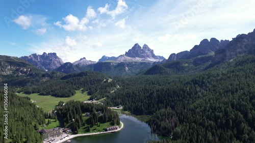 DRONE AERIAL FOOTAGE: Lake Misurina and the Tre Cime di Lavaredo (Three Peaks of Lavaredo) in the Sexten Dolomites of northeastern Italy. They are one of the best-known mountain groups in the Alps.