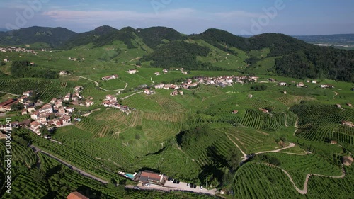 DRONE AERIAL FOOTAGE: Famous Prosecco Hills in Veneto wine region. The DOCG Cartizze Hills. The Cartizze area is located in the municipality of Valdobbiadene (Treviso, Italy).