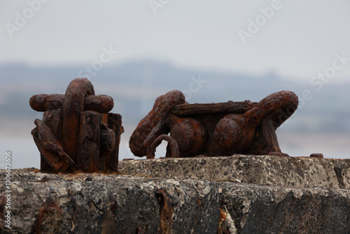 rusty anchor on the pier