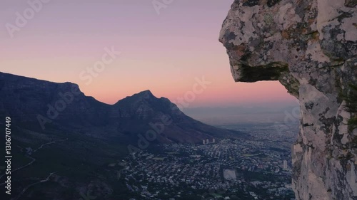Late sunset shot over the table top mountains and Cape Town on a beautiful summer evening. Shot in 4K resolution.