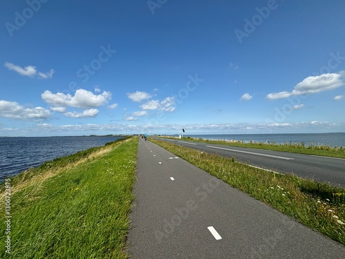 Fototapete bicycle path on a dike