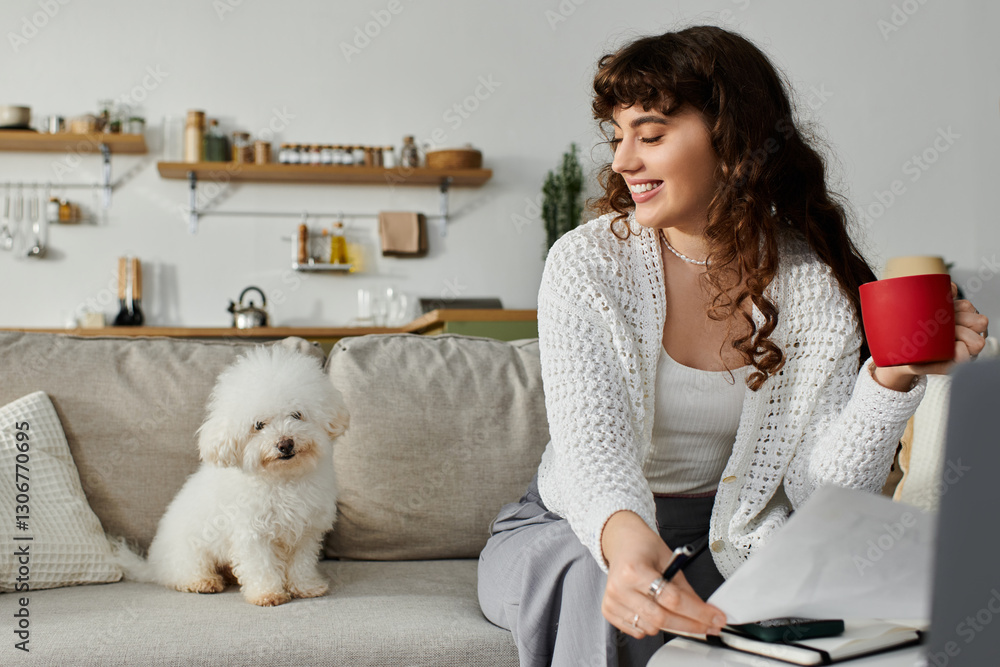 Φωτογραφία Young woman enjoys coffee on cozy sofa while playful dog watches in modern livin