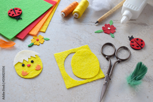 Handmade Felt Easter Chick. DIY Spring Craft Project with Colorful Supplies, Sewing Materials, Scissors, and Festive Decorations for Creative Fun, Kids and Hobby Enthusiasts