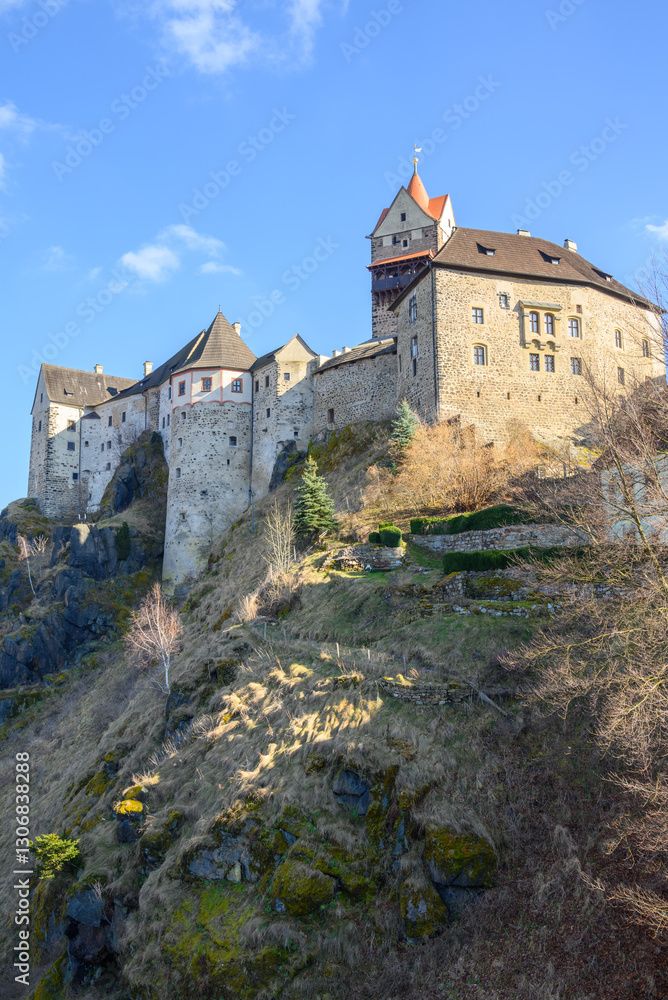 Loket Castle, a 12th-century gothic castle in the Karlovy Vary Region in Czech Republic. Loket Castle, a 12th-century gothic castle in the Karlovy Vary Region in Czech Republic.