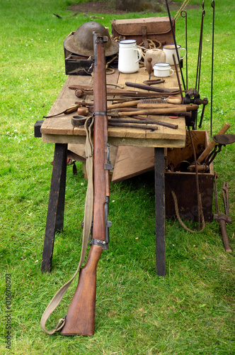 Wallpaper Mural A WW1 rifle propped up against a table. Torontodigital.ca