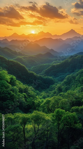 Sunset Over Lush Green Valley Surrounded by Mountains in Tranquil Landscape