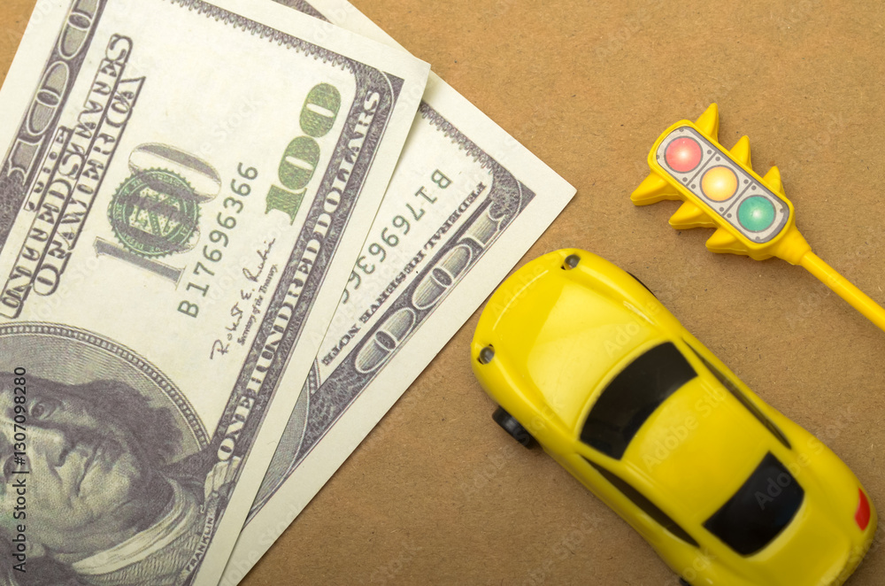 Obraz premium Wealth and Wheels: The Intersection of Finance and Transportation in Miniature Form