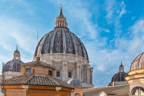 Majestic dome of St. Peter's Basilica against blue sky