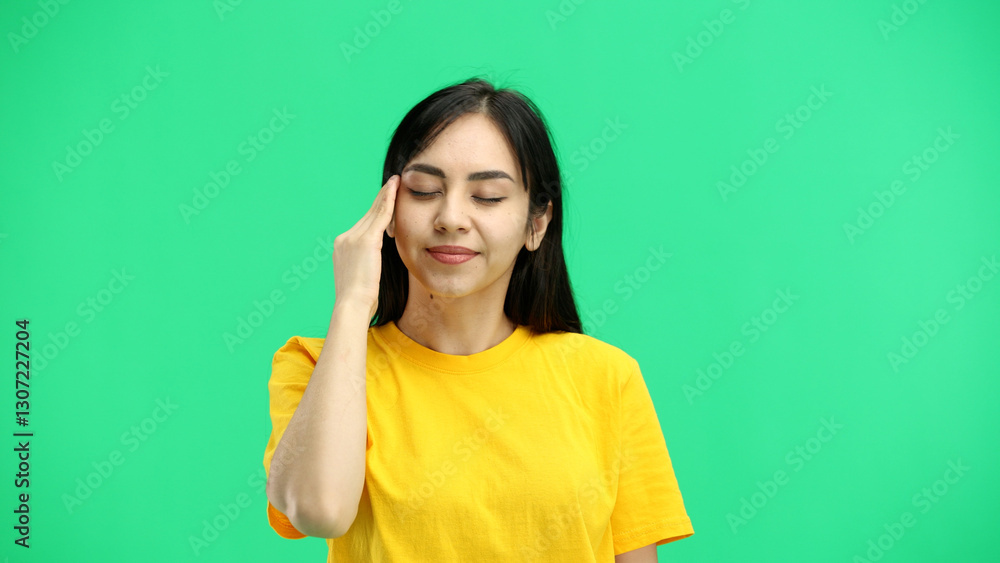 A woman, close-up, on a green background, tired A woman, close-up, on a green background, tired