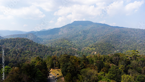 Wallpaper Mural Doi Suthep-Pui National Park landscape with winding road and lush forest covering mountains Torontodigital.ca