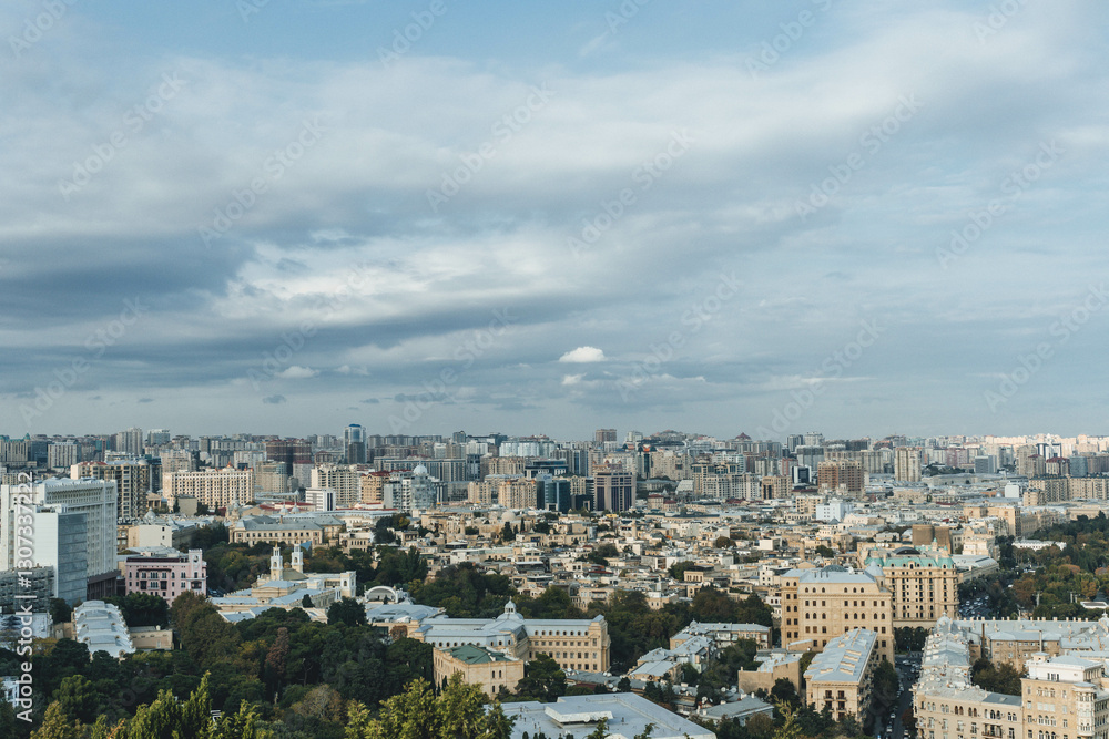 top panoramic view of baku city with huge area with buildings and parks around Icheri Sheher over cloudy sky top panoramic view of baku city with huge area with buildings and parks around Icheri Sheher over cloudy sky