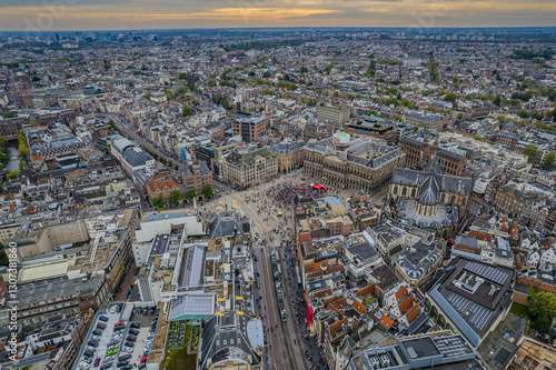Canvas Print Stunning aerial view of Koninklijk Paleis - The Royal Palace in Amsterdam showcasing its iconic architecture, the iconic Town squareand vibrant cityscape