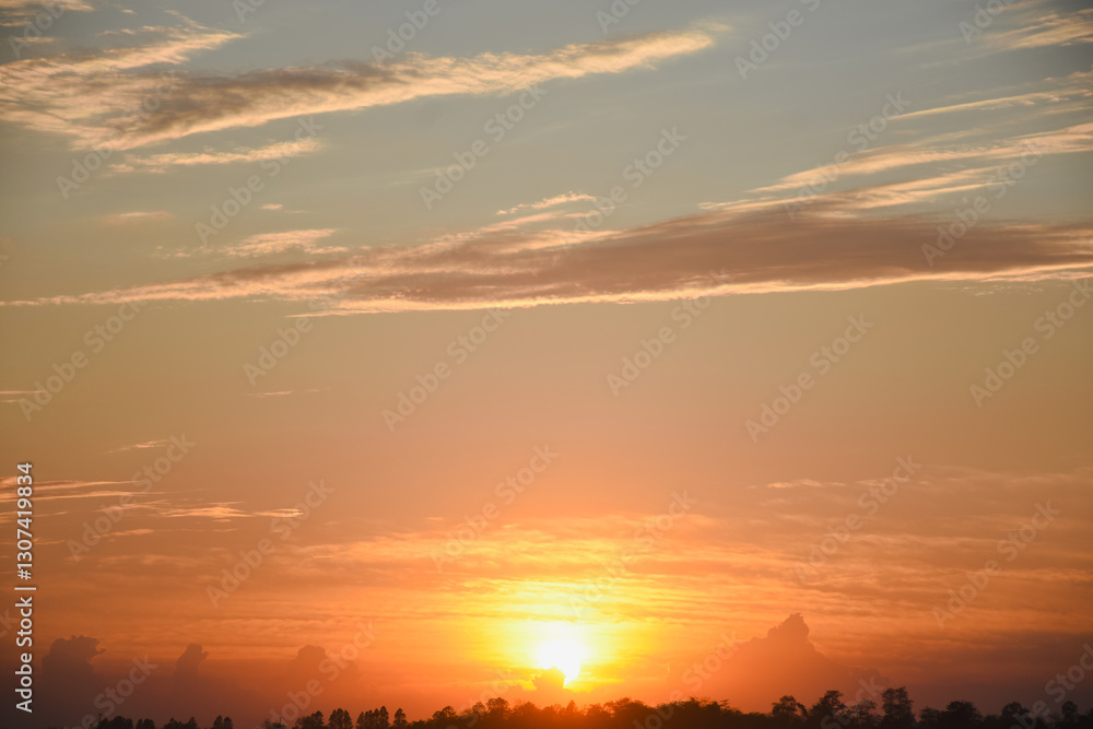 Orange sky with clouds at sunset Orange sky with clouds at sunset