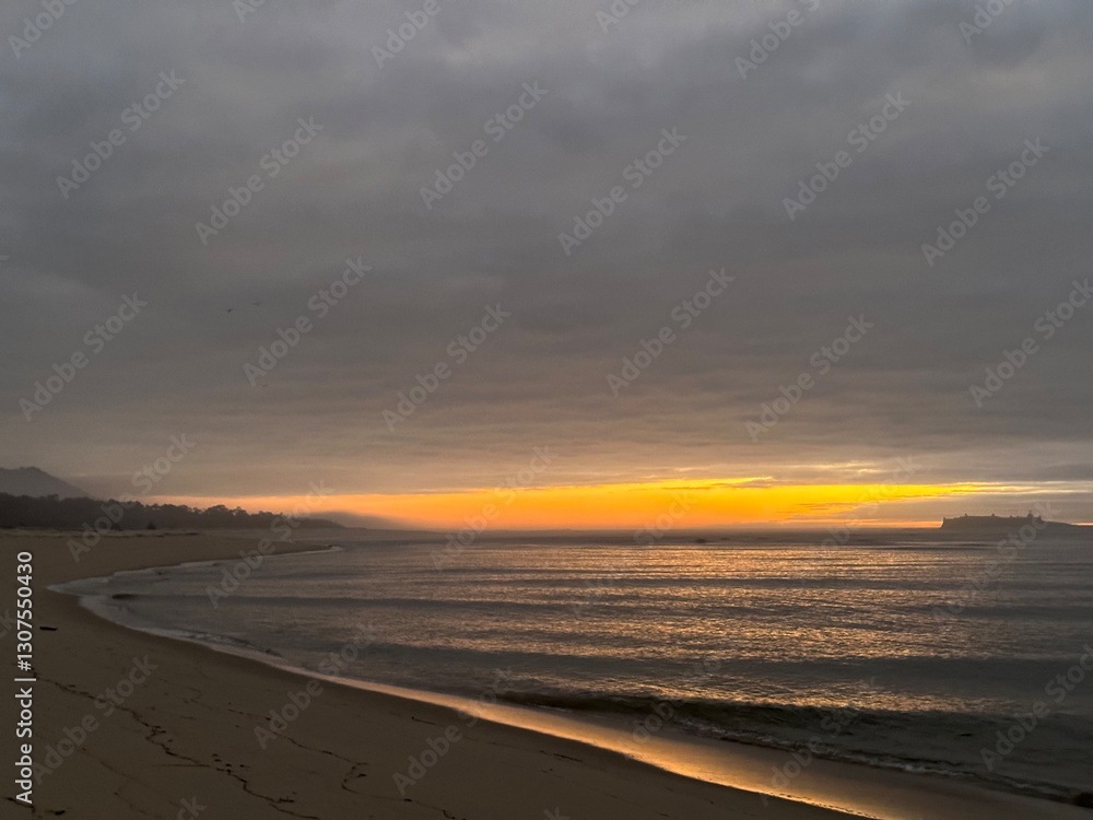 Sunset over the Atlantic Ocean beach and Forte da Ínsua fort near Caminha, Viana do Castelo, Portugal, January 2024