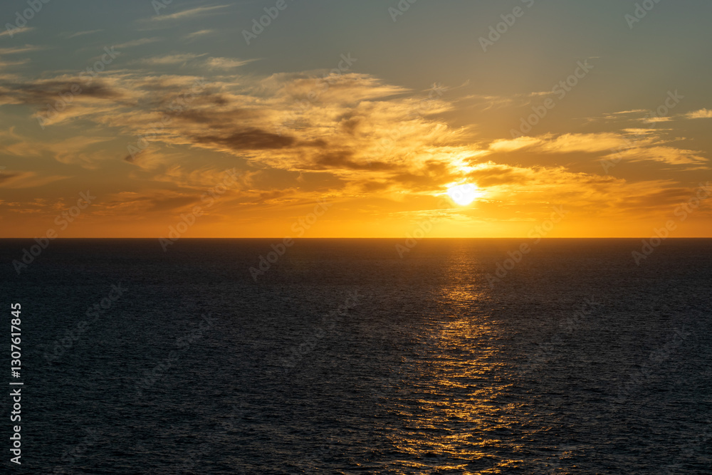 Beautiful sunset with great cloudscape over the Pacific and the reflection of the sun in the sea. Beautiful sunset with great cloudscape over the Pacific and the reflection of the sun in the sea.