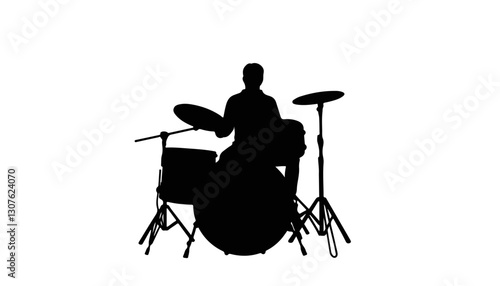 Silhouette of drummer playing on stage