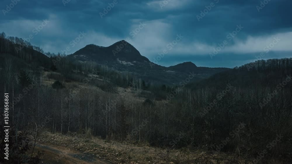 A quiet countryside view, where nature transitions between seasons A quiet countryside view, where nature transitions between seasons