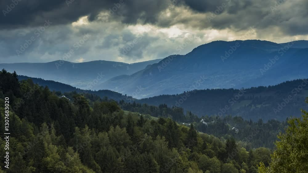 Carpathians mountains in autumnal season - panorama and clouds. Time-lapse. Mist and clouds gently rolls over the autumn-colored hills. The blend of light, shadow and fog creates a serene atmosphere. Carpathians mountains in autumnal season - panorama and clouds. Time-lapse. Mist and clouds gently rolls over the autumn-colored hills. The blend of light, shadow and fog creates a serene atmosphere.