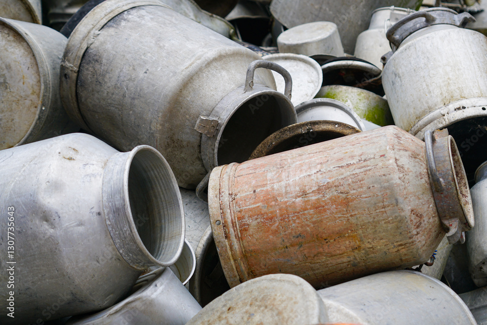 Large pile of various old aluminum pots and cans, aluminum scrap background Large pile of various old aluminum pots and cans, aluminum scrap background