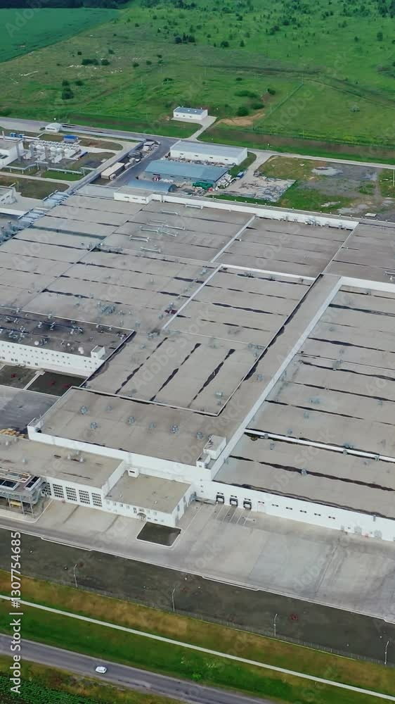 Aerial view of industrial area. Aerial view of factory plant producing. Vertical video Aerial view of industrial area. Aerial view of factory plant producing. Vertical video