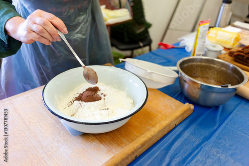The chef is making a chocolate cake.