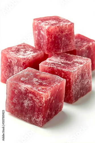 A pile of red cubes of ice cubes on a white surface