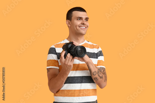 Male photographer with mode...
