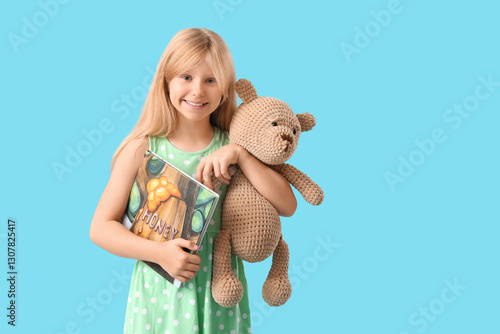 Cute little girl with plush...