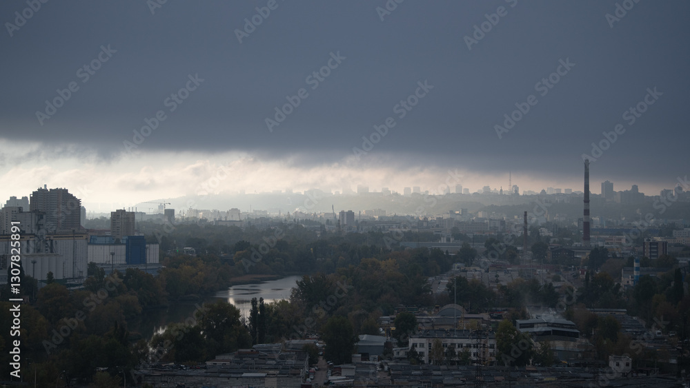 Dark clouds gather above the city skyline, casting shadows over buildings and trees as the day transitions into evening. A river reflects the changing light, creating a moody atmosphere Dark clouds gather above the city skyline, casting shadows over buildings and trees as the day transitions into evening. A river reflects the changing light, creating a moody atmosphere