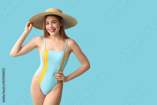 Beautiful young woman in ta...