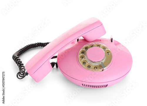 Pink retro telephone on whi...