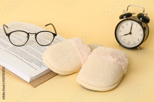White slippers, alarm clock...