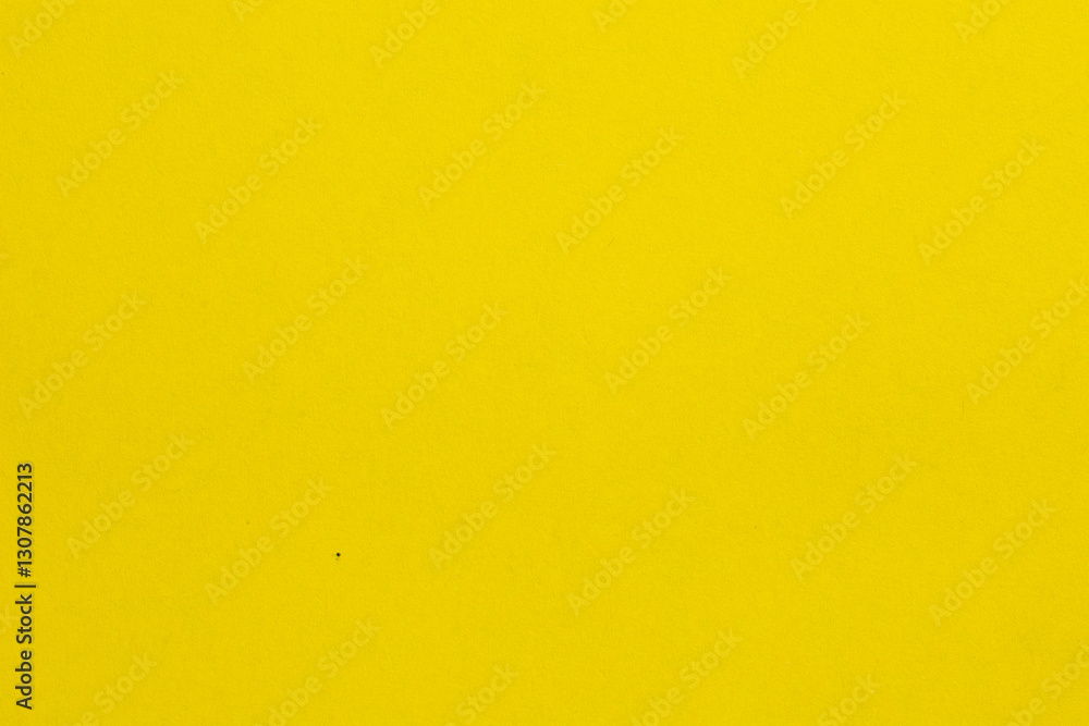 Obraz premium A yellow background with no visible objects, textured origami paper backdrop
