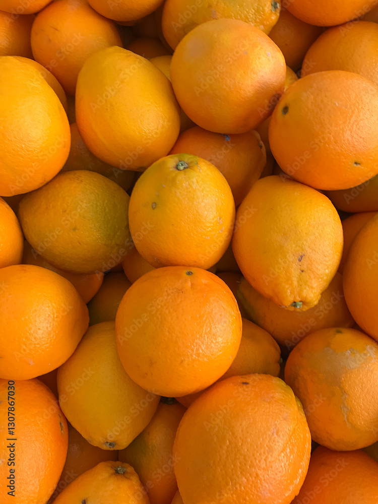 Close-up of Bahia oranges, highlighting the peel texture and vibrant color. Ideal for projects on citrus fruits, culinary, and fresh food. Close-up of Bahia oranges, highlighting the peel texture and vibrant color. Ideal for projects on citrus fruits, culinary, and fresh food.