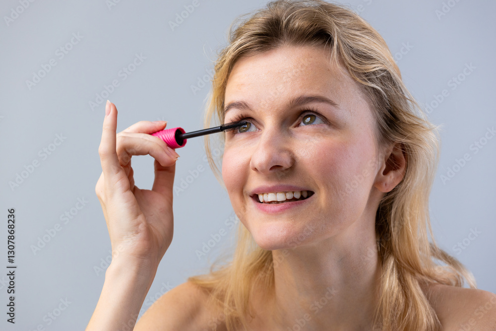 Applying Mascara: A Bright and Cheerful Experience for Enhanced Eye Beauty and Confidence with Perfectly Defined Lashes in a Professional Makeup Setting Applying Mascara: A Bright and Cheerful Experience for Enhanced Eye Beauty and Confidence with Perfectly Defined Lashes in a Professional Makeup Setting