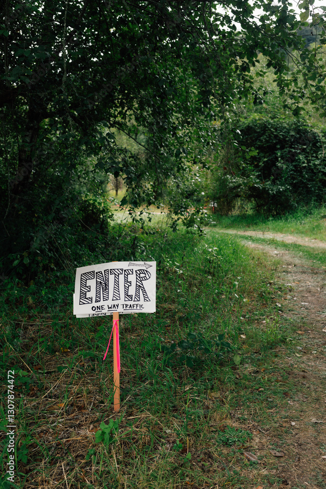 hand drawn Enter sign in the woods, campsite hand drawn Enter sign in the woods, campsite