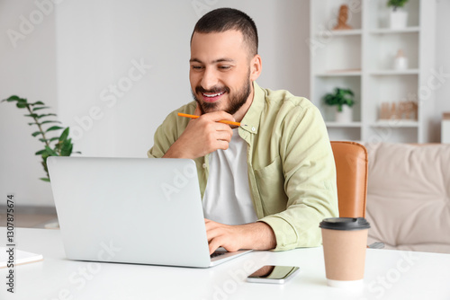 Freelance worker using lapt...