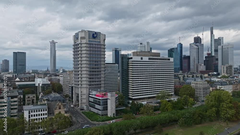 Aerial Drone View of Frankfurt’s Financial District with Modern Skyscrapers Rising Over Historic Rooftops . Aerial Drone View of Frankfurt’s Financial District with Modern Skyscrapers Rising Over Historic Rooftops .