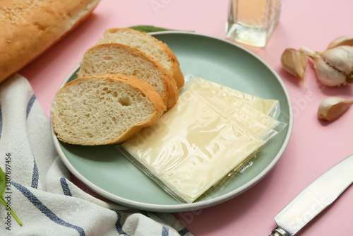 Sliced baguette bread and p...