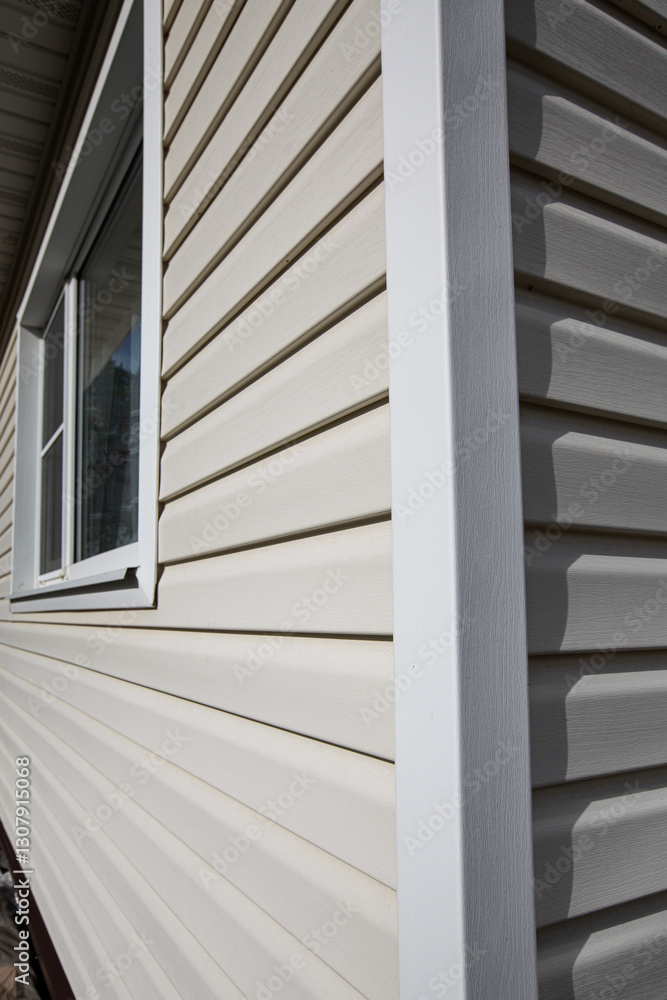 Obraz premium The corner of a house made with siding planks