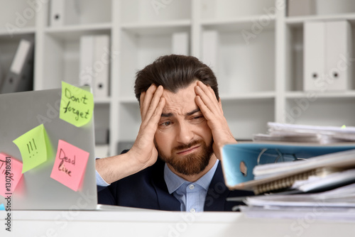 Stressed businessman with a...