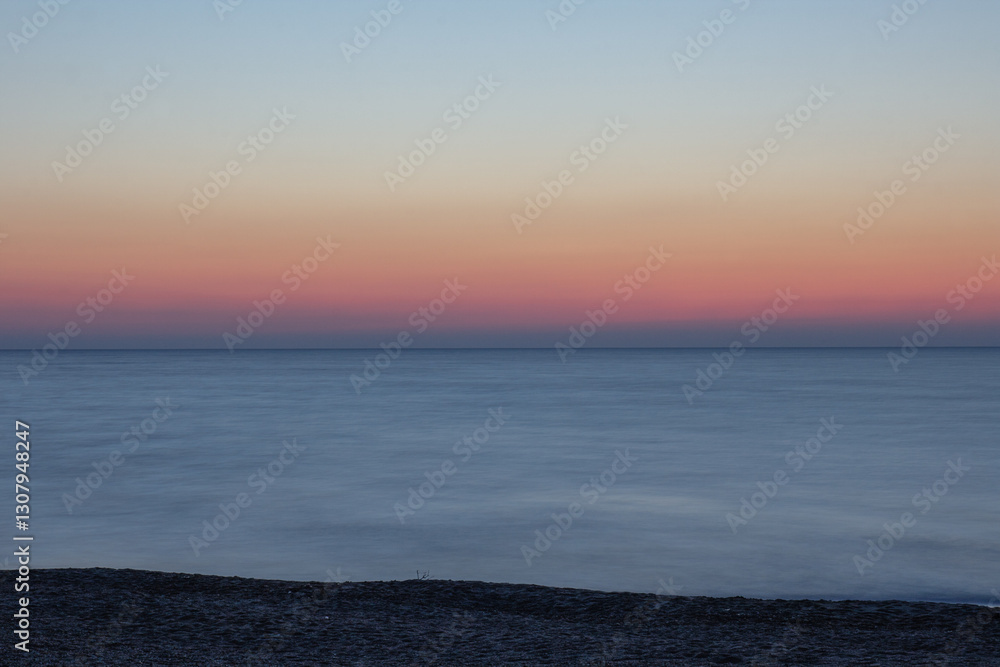 Naklejka premium Sea sunrise landdscape. Long exposure